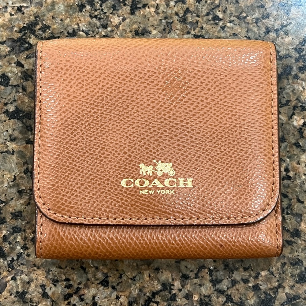 Coach tan cross grain leather trifold wallet with RAINBOW COLORBLOCK INTERIOR